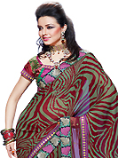 The fascinating beautiful subtly garment with lovely patterns. This dusty green and maroon faux georgette and net have beautiful abstract print and embroidery patch work which is embellished with resham, zari and stone work. Fabulous designed embroidery gives you an ethnic look and increasing your beauty. Matching blouse is available. Slight Color variations are possible due to differing screen and photograph resolutions.