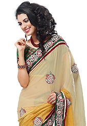 The traditional patterns used on this saree maintain the ethnic look. This cream and yellow crush georgette have beautiful embroidery patch work which is embellished with resham, zari, stone and beads work. Fabulous designed embroidery gives you an ethnic look and increasing your beauty. Contrasting green blouse is available. Slight Color variations are possible due to differing screen and photograph resolutions.