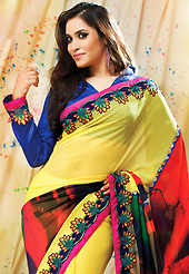 The fascinating beautiful subtly garment with lovely patterns. This yellow and red faux georgette saree have beautiful embroidery patch work which is embellished with resham and zari work. Fabulous designed embroidery gives you an ethnic look and increasing your beauty. Contrasting dark blue blouse is available. Slight Color variations are possible due to differing screen and photograph resolutions.