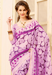 Keep the interest with this printed saree. This beautiful light purple super net saree is nicely designed with dot and leaf like print work. Beautiful print work on saree make attractive to impress all. It will enhance your personality and gives you a singular look. Matching blouse is available with this saree. Slight color variations are due to differing screen and photography resolution.