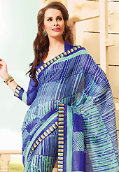 Get ready to sizzle all around you by sparkling saree. This beautiful blue and light sea green super net saree is nicely designed with abstract, stripe print and graceful patch border. Beautiful print work on saree make attractive to impress all. It will enhance your personality and gives you a singular look. Matching blouse is available with this saree. Slight color variations are due to differing screen and photography resolution.