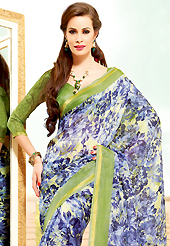 A desire that evokes a sense of belonging with a striking details. This beautiful blue and light olive green super net saree is nicely designed with floral print work. Beautiful print work on saree make attractive to impress all. It will enhance your personality and gives you a singular look.Matching blouse is available with this saree. Slight color variations are due to differing screen and photography resolution.