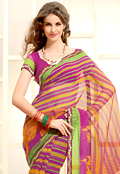 The traditional patterns used on this saree maintain the ethnic look. This beautiful magenta and orange super net saree is nicely designed with floral, stripe print and graceful patch border. Beautiful print work on saree make attractive to impress all. It will enhance your personality and gives you a singular look. Matching blouse is available with this saree. Slight color variations are due to differing screen and photography resolution.