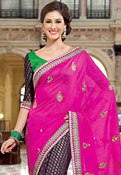 The traditional patterns used on this saree maintain the ethnic look. This magenta and dark navy blue georgette and viscose saree have beautiful embroidery patch work which is embellished with resham and zari work. Fabulous designed embroidery gives you an ethnic look and increasing your beauty. Contrasting green and dark navy blue blouse is available. Slight Color variations are possible due to differing screen and photograph resolutions.