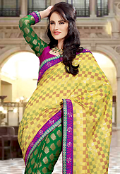 The glamorous silhouette to meet your most dire fashion needs. This yellow and green dupion and viscose saree have beautiful embroidery patch work which is embellished with resham and zari work. Fabulous designed embroidery gives you an ethnic look and increasing your beauty. Contrasting dark pink and green blouse is available. Slight Color variations are possible due to differing screen and photograph resolutions.