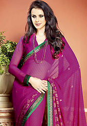 Make a trendy look with this classic printed saree. This beautiful magenta faux georgette saree is nicely designed with abstract and gold print work. Beautiful print work on saree make attractive to impress all. It will enhance your personality and gives you a singular look. Matching blouse is available with this saree. Slight color variations are due to differing screen and photography resolution.