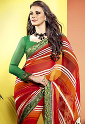 Try out this year top trend, glowing, bold and natural collection. This beautiful red, orange and off white faux georgette saree is nicely designed with floral, stripe print and graceful patch border. Beautiful print work on saree make attractive to impress all. It will enhance your personality and gives you a singular look. Contrasting green blouse is available with this saree. Slight color variations are due to differing screen and photography resolution.