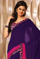 A desire that evokes a sense of belonging with a striking details. This beautiful dark purple and shaded pink faux georgette saree is nicely designed with flower print and graceful patch border. Beautiful print work on saree make attractive to impress all. It will enhance your personality and gives you a singular look. Matching blouse is available with this saree. Slight color variations are due to differing screen and photography resolution.