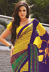 Style and trend will be at the peak of your beauty when you adorn this saree. This beautiful yellow, purple and green faux georgette saree is nicely designed with floral, abstract and stripe print work. Beautiful print work on saree make attractive to impress all. It will enhance your personality and gives you a singular look. Matching blouse is available with this saree. Slight color variations are due to differing screen and photography resolution.