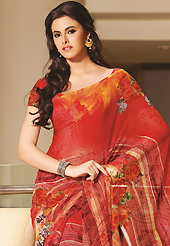 The traditional patterns used on this saree maintain the ethnic look. This beautiful red faux georgette saree is nicely designed with floral and abstract print work. Beautiful print work on saree make attractive to impress all. It will enhance your personality and gives you a singular look. Matching blouse is available with this saree. Slight color variations are due to differing screen and photography resolution.