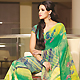 Green Faux Georgette Saree with Blouse