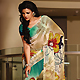 Cream and Green Faux Georgette Saree with Blouse