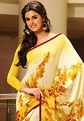Try out this year top trend, glowing, bold and natural collection. This beautiful shaded cream and yellow faux georgette saree is nicely designed with floral and stripe print work. Beautiful print work on saree make attractive to impress all. It will enhance your personality and gives you a singular look. Matching blouse is available with this saree. Slight color variations are due to differing screen and photography resolution.