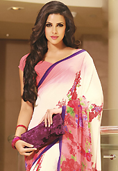 Dreamy variation on shape and forms compliment your style with tradition. This beautiful shaded cream and pink faux georgette saree is nicely designed with floral and stripe print work. Beautiful print work on saree make attractive to impress all. It will enhance your personality and gives you a singular look. Matching blouse is available with this saree. Slight color variations are due to differing screen and photography resolution.