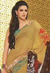 It is color this season and bright shaded suits are really something that is totally in vogue. This beautiful fawn faux georgette saree is nicely designed with abstract and paisley print work. Beautiful print work on saree make attractive to impress all. It will enhance your personality and gives you a singular look. Matching blouse is available with this saree. Slight color variations are due to differing screen and photography resolution.