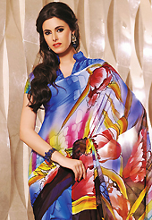 The traditional patterns used on this saree maintain the ethnic look. This beautiful blue faux georgette saree is nicely designed with abstract and floral print work. Beautiful print work on saree make attractive to impress all. It will enhance your personality and gives you a singular look. Matching blouse is available with this saree. Slight color variations are due to differing screen and photography resolution.