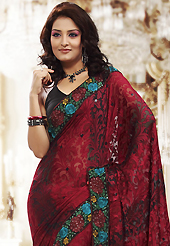Try out this year top trend, glowing, bold and natural collection. This maroon brasso saree is nicely designed with embroidered patch work is done with resham and sequins work. Beautiful embroidery work on saree make attractive to impress all. This saree gives you a modern and different look in fabulous style. Contrasting black blouse is available. Slight color variations are possible due to differing screen and photograph resolution.