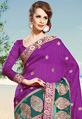 The evolution of style species collection spells pure femininity. This magenta and green art silk and net saree is nicely designed with embroidered patch work is done with zari work. Beautiful embroidery work on saree make attractive to impress all. This saree gives you a modern and different look in fabulous style. Matching blouse is available. Slight color variations are possible due to differing screen and photograph resolution.