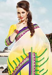 An endearing splash oh colors look gorgeous tridimensional charm. This shaded cream, yellow and green chiffon saree is nicely designed with embroidered patch work is done with resham and zari work. Beautiful embroidery work on saree make attractive to impress all. This saree gives you a modern and different look in fabulous style. Matching blouse is available. Slight color variations are possible due to differing screen and photograph resolution.