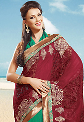 Keep the interest with this designer embroidery saree. This cream jacquard saree is nicely designed with embroidered patch work is done with zari work. Beautiful embroidery work on saree make attractive to impress all. This saree gives you a modern and different look in fabulous style. Contrasting magenta blouse is available. Slight color variations are possible due to differing screen and photograph resolution.