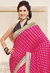The most beautiful refinements for style and tradition. This dark pink viscose georgette saree is nicely designed with embroidered patch work is done with zari and sequins work. This saree gives you a modern and different look in fabulous style. Contrasting black blouse is available. Slight color variations are possible due to differing screen and photograph resolution.
