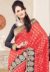Take a look on the changing fashion of the season. This coral viscose georgette saree is nicely designed with embroidered patch work is done with zari and lace work. This saree gives you a modern and different look in fabulous style. Contrasting black blouse is available. Slight color variations are possible due to differing screen and photograph resolution.