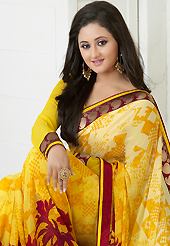The most beautiful refinements for style and tradition. This shaded yellow georgette saree is nicely designed with floral, abstract print, self weaving zari and patch bordered work. Beautiful embroidery work on saree make attractive to impress all. This saree gives you a modern and different look in fabulous style. Matching blouse is available. Slight color variations are possible due to differing screen and photograph resolution.