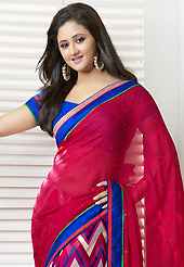 Exquisite combination of color, fabric can be seen here. This deep pink and off white georgette jacquard saree is nicely designed with zig zag print, stone and patch bordered work. Beautiful embroidery work on saree make attractive to impress all. This saree gives you a modern and different look in fabulous style. Contrasting blue blouse is available. Slight color variations are possible due to differing screen and photograph resolution.