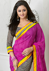 Envelope yourself in classic look with this charming saree. This pink, black and off white georgette saree is nicely designed with paisley, floral print and patch bordered work. Beautiful embroidery work on saree make attractive to impress all. This saree gives you a modern and different look in fabulous style. Matching blouse is available. Slight color variations are possible due to differing screen and photograph resolution.