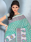 Era with extension in fashion, style, Grace and elegance have developed grand love affair with this ethnical wear. This beautiful sea green and white cotton saree is nicely designed with paisley and geometric print work. It will enhance your personality and gives you a singular look. Matching blouse is available with this saree. Slight color variations are due to differing screen and photography resolution.