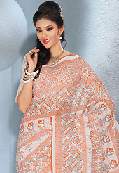 Style and trend will be at the peak of your beauty when you adorn this saree. This beautiful white and light rust cotton saree is nicely designed with floral and abstract print work. It will enhance your personality and gives you a singular look. Matching blouse is available with this saree. Slight color variations are due to differing screen and photography resolution.