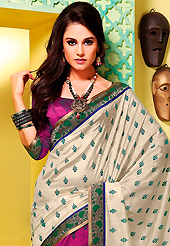 Era with extension in fashion, style, Grace and elegance have developed grand love affair with this ethnical wear. This off white and magenta art silk saree is nicely designed with floral, abstract print and embroidered patch work is done with resham work. Beautiful embroidery work on saree make attractive to impress all. This saree gives you a modern and different look in fabulous style. Matching blouse is available. Slight color variations are possible due to differing screen and photograph resolution.
