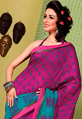 Make a trendy look with this classic embroidered saree. This magenta and turquoise green art silk saree is nicely designed with floral, abstract print, lace and patch work. Beautiful embroidery work on saree make attractive to impress all. This saree gives you a modern and different look in fabulous style. Matching blouse is available. Slight color variations are possible due to differing screen and photograph resolution.