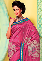 Try out this year top trend, glowing, bold and natural collection. This pink art silk saree is nicely designed with floral print, self weaving zari and patch bordered work. Beautiful embroidery work on saree make attractive to impress all. This saree gives you a modern and different look in fabulous style. Matching blouse is available. Slight color variations are possible due to differing screen and photograph resolution.