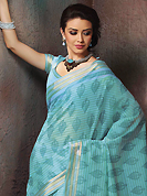 Get ready to sizzle all around you by sparkling saree. This beautiful blue cotton saree is nicely designed with floral, abstract print and self weaving zari work. Beautiful print work on saree make attractive to impress all. It will enhance your personality and gives you a singular look. Matching blouse is available with this saree. Slight color variations are due to differing screen and photography resolution.