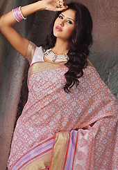 Make a trendy look with this classic printed saree. This beautiful off white and pink cotton saree is nicely designed with floral, abstract, geometric print and self weaving zari work. Beautiful print work on saree make attractive to impress all. It will enhance your personality and gives you a singular look. Matching blouse is available with this saree. Slight color variations are due to differing screen and photography resolution.