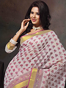 Welcome to the new era of Indian fashion wear. This beautiful off white and pink cotton saree is nicely designed with floral, paisley, abstract print and self weaving zari work. Beautiful print work on saree make attractive to impress all. It will enhance your personality and gives you a singular look. Matching blouse is available with this saree. Slight color variations are due to differing screen and photography resolution.