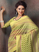 Dreamy variation on shape and forms compliment your style with tradition. This beautiful green and dark cream cotton saree is nicely designed with stripe, floral, abstract print and self weaving zari work. Beautiful print work on saree make attractive to impress all. It will enhance your personality and gives you a singular look. Matching blouse is available with this saree. Slight color variations are due to differing screen and photography resolution.