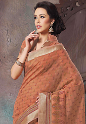 An endearing splash oh colors look gorgeous tridimensional charm. This beautiful light rust cotton saree is nicely designed with paisley, abstract, geometric print and self weaving zari work. Beautiful print work on saree make attractive to impress all. It will enhance your personality and gives you a singular look. Matching blouse is available with this saree. Slight color variations are due to differing screen and photography resolution.