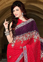 Elegance and innovation of designs crafted for you. This red and dark burgundy faux georgette and velvet saree have beautiful embroidery patch work which is embellished with resham, zari, sequins, stone and cutbeads work. Fabulous designed embroidery gives you an ethnic look and increasing your beauty. Matching blouse is available. Slight Color variations are possible due to differing screen and photograph resolutions.