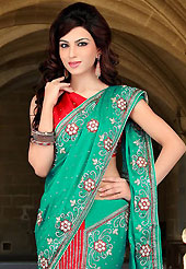 Emblem of fashion and beauty, each piece of our range of embroidered saree is certain to enhance your look as per today’s trends. This green and red faux chiffon lehenga style saree have beautiful embroidery patch work which is embellished with sequins, stone and cutbeads work. Fabulous designed embroidery gives you an ethnic look and increasing your beauty. Matching blouse is available. Slight Color variations are possible due to differing screen and photograph resolutions.