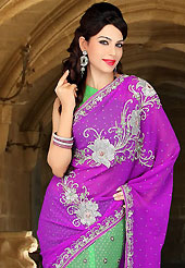 Try out this year top trend, glowing, bold and natural collection. This purple and green faux chiffon lehenga style saree have beautiful embroidery patch work which is embellished with zari, sequins, stone and cutbeads work. Fabulous designed embroidery gives you an ethnic look and increasing your beauty. Matching blouse is available. Slight Color variations are possible due to differing screen and photograph resolutions.