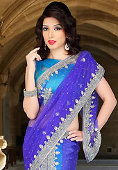 Keep the interest with this designer embroidery saree. This dark blue and light blue net lehenga style saree have beautiful embroidery patch work which is embellished with sequins, stone, cutdana and cutbeads work. Fabulous designed embroidery gives you an ethnic look and increasing your beauty. Matching blouse is available. Slight Color variations are possible due to differing screen and photograph resolutions.