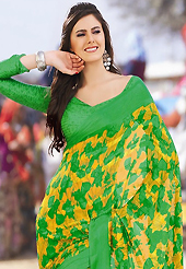 You can be sure that ethnic fashions selections of clothing are taken from the latest trend in today’s fashion. This beautiful yellow and green brasso faux georgette saree is nicely designed with abstract, floral and stripe print work. Beautiful print work on saree make attractive to impress all. It will enhance your personality and gives you a singular look. Matching blouse is available with this saree. Slight color variations are due to differing screen and photography resolution.