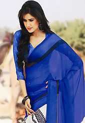 It is color this season and bright shaded suits are really something that is totally in vogue. This beautiful blue and white faux chiffon saree is nicely designed with paisley print work. Beautiful print work on saree make attractive to impress all. It will enhance your personality and gives you a singular look. Matching blouse is available with this saree. Slight color variations are due to differing screen and photography resolution.
