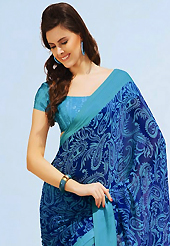 An occasion wear perfect is ready to rock you. This beautiful blue and sea green faux chiffon saree is nicely designed with paisley print work. Beautiful print work on saree make attractive to impress all. It will enhance your personality and gives you a singular look. Matching blouse is available with this saree. Slight color variations are due to differing screen and photography resolution.