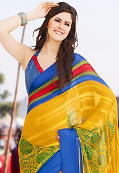 Get ready to sizzle all around you by sparkling saree. This beautiful yellow, blue and red brasso faux georgette saree is nicely designed with floral and abstract print work. Beautiful print work on saree make attractive to impress all. It will enhance your personality and gives you a singular look. Matching blouse is available with this saree. Slight color variations are due to differing screen and photography resolution.