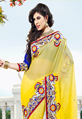 Emblem of fashion and beauty, each piece of our range of embroidered saree is certain to enhance your look as per today’s trends. This yellow viscose georgette saree have beautiful embroidery patch work which is embellished with resham, zari, stone and beads work. Fabulous designed embroidery gives you an ethnic look and increasing your beauty. Contrasting royal blue blouse is available. Slight Color variations are possible due to differing screen and photograph resolutions.