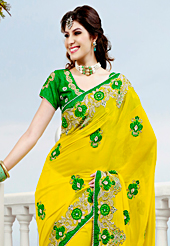 Welcome to the new era of Indian fashion wear. This yellow viscose georgette saree have beautiful embroidery patch work which is embellished with resham, stone and beads work. Fabulous designed embroidery gives you an ethnic look and increasing your beauty. Contrasting green blouse is available. Slight Color variations are possible due to differing screen and photograph resolutions.