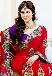 Style and trend will be at the peak of your beauty when you adorn this saree. This red crepe silk saree have beautiful embroidery patch work which is embellished with resham and stone work. Fabulous designed embroidery gives you an ethnic look and increasing your beauty. Contrasting purple blouse is available. Slight Color variations are possible due to differing screen and photograph resolutions.